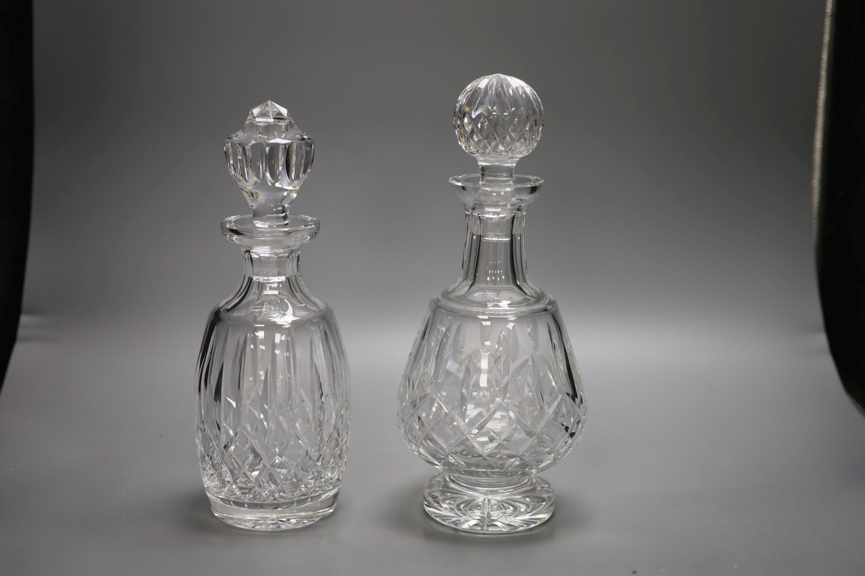 Two Waterford crystal decanters and stoppers, height 30cm